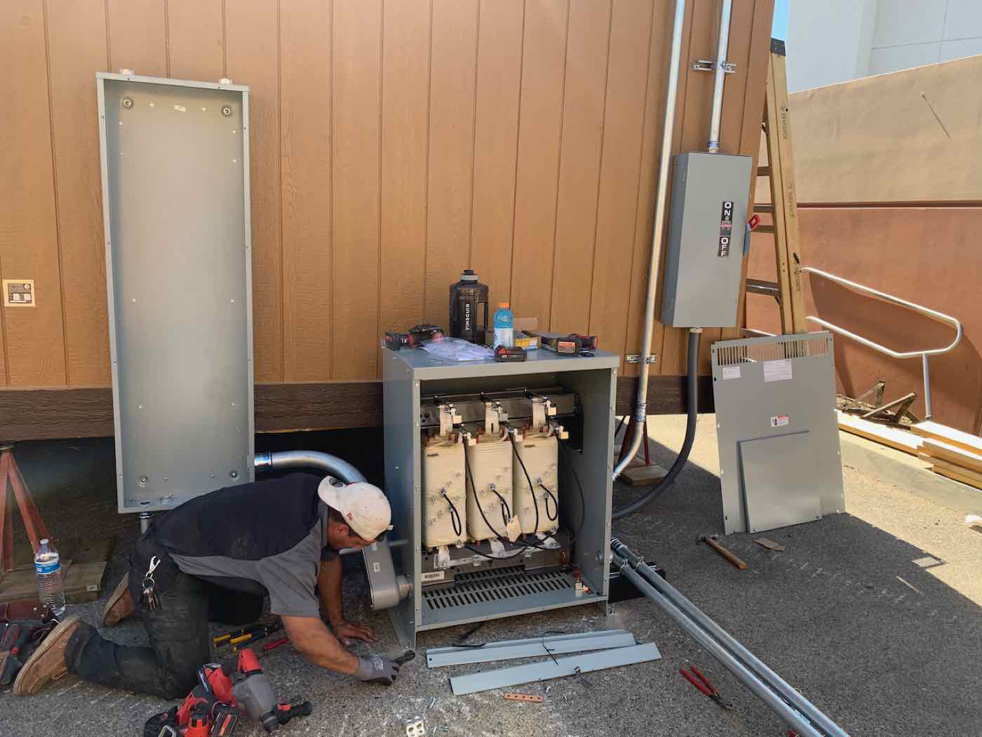 A Duo Electric technician working on commercial switchgear.